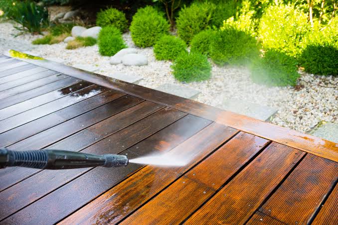 Pressure washing a wood deck in Mountain Grove, MO