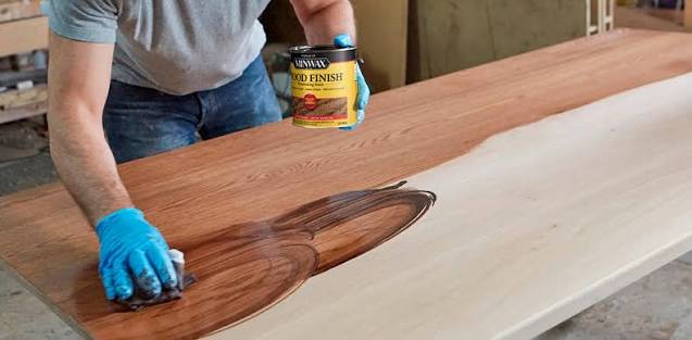 Applying wood stain finish to wood in Mountain Grove, MO